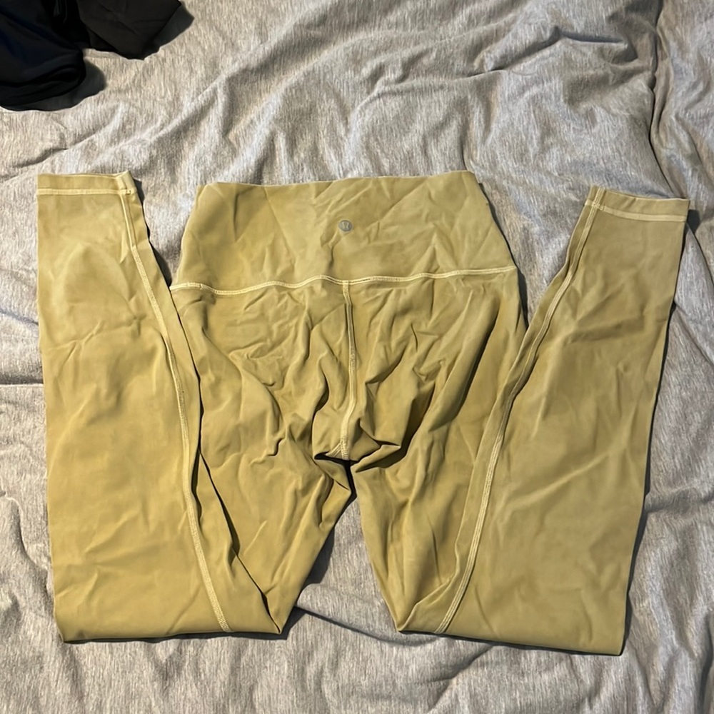 Lululemon leggings. Rare washed pale lime green color. Size 6. Perfect condition